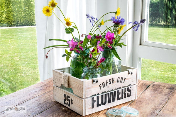 Fresh Cut Flowers 25 cents stencil by Funky Junk's Old Sign Stencils is a 1-piece flower stencil that celebrates displaying fresh cut flowers! Designed with subtext, bold FLOWERS, 25 cents, and flowers with leaves graphics. Designed to fit on small (IKEA) crates, create small signs, throw pillow designs and more!