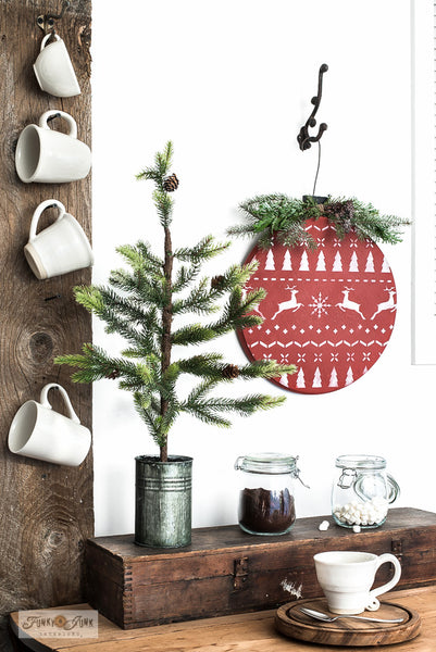 Make a Christmas sweater styled lazy susan or wood ornament from a wood round with Funky Junk's Old Sign Stencils!
