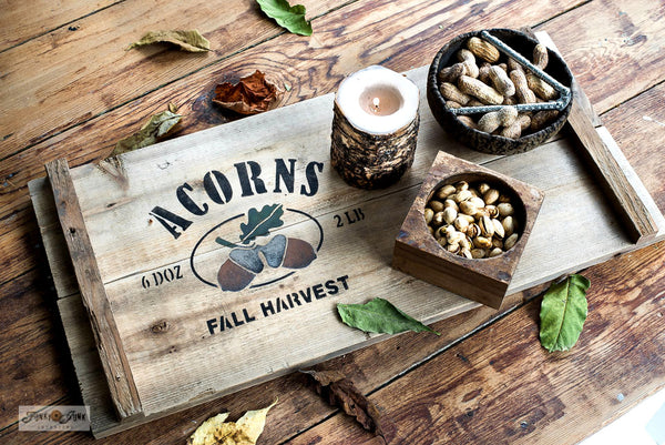 Acorns all-season or fall stencil by Funky Junk's Old Sign Stencils is a nut orchard themed stencil. Comes with bold text along with 2 capped acorn graphics and a leaf. Perfectly sized to stencil a harvested fall nut vibe onto crates, throw pillows, grain sacks or signs.