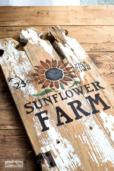Sunflower Farm stencils by Funky Junk's Old Sign Stencils are fall-themed stencils in 2 sizes. Small includes a sunflower, 25 cents & 'pick your own', that fit crates, throw pillows or smaller fall projects. Large vertical includes a tall sunflower stalk growing inside a rustic crate sized for a vertical porch sign.