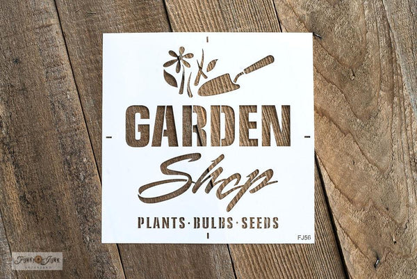 Garden Shop stencil by Funky Junk's Old Sign Stencils celebrates all things garden, crate or grain sack style! Big, bold timeless letters with a decorative garden trowel and flowers to capture the entire garden loving story. This stencil is compact for smaller garden projects.