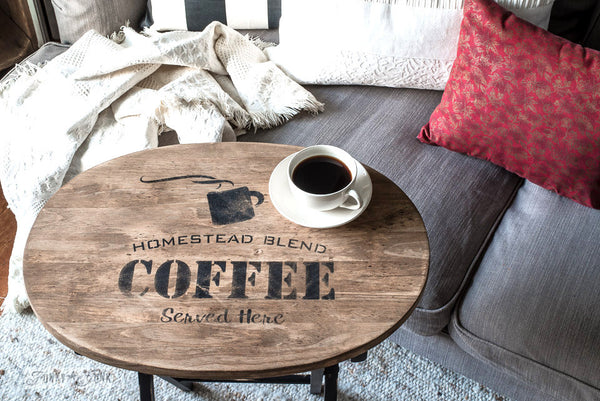 Homestead Blend Coffee - Served Here by Funky Junk's Old Sign Stencils is a 1-piece coffee-themed stencil that offers visions of your favorite coffee shop! Designed with bold coffee letters, subtext, and a steaming mug graphic. This coffee stencil is perfect for stenciling on crates, pillows, tv trays, signs and more!