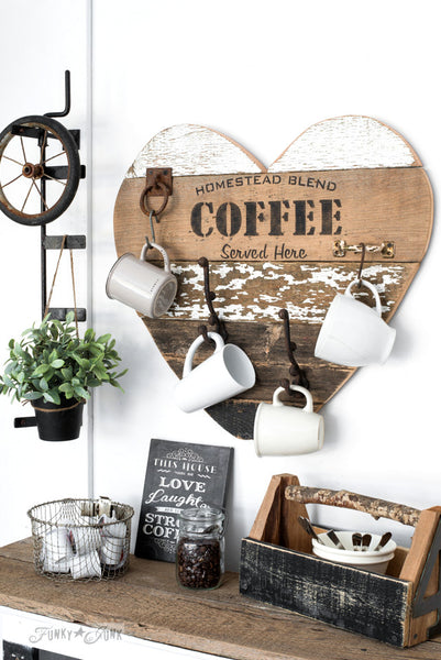 Homestead Blend Coffee - Served Here by Funky Junk's Old Sign Stencils is a 1-piece coffee-themed stencil that offers visions of your favorite coffee shop! Designed with bold coffee letters, subtext, and a steaming mug graphic. This coffee stencil is perfect for stenciling on crates, pillows, tv trays, signs and more!