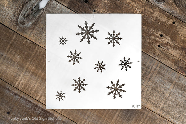 Large Snowflakes stencil by Funky Junk's Old Sign Stencils is a Christmas and winter snowflake stencil pattern that is designed to repeat randomly, with no exact matching-up edges required! A flurry of 9 different sized snowflakes fall from the sky, twisting in random directions.