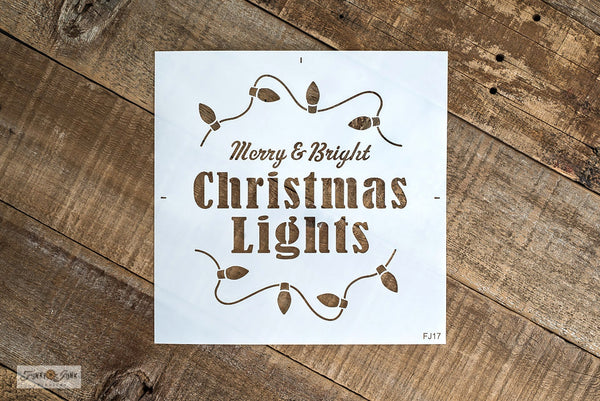 Merry & Bright Christmas Lights stencil by Funky Junk's Old Sign Stencils is a festive Christmas stencil that's all about the illuminated magic of Christmas! Bold graphics are tucked inside 2 curvy strings of vintage Christmas tree lights curving above and below the text. Sized for a Christmas pillow or tree crate.