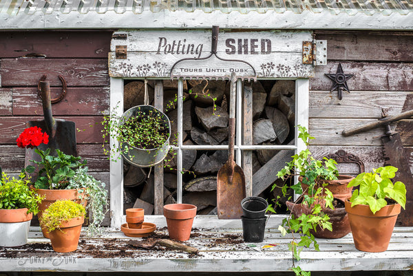 Potting Shed rake sign on a shed with Funky Junk's Old Sign Stencils. Paint professional looking vintage farmhouse styled garden signs onto reclaimed wood with a stencil in minutes!