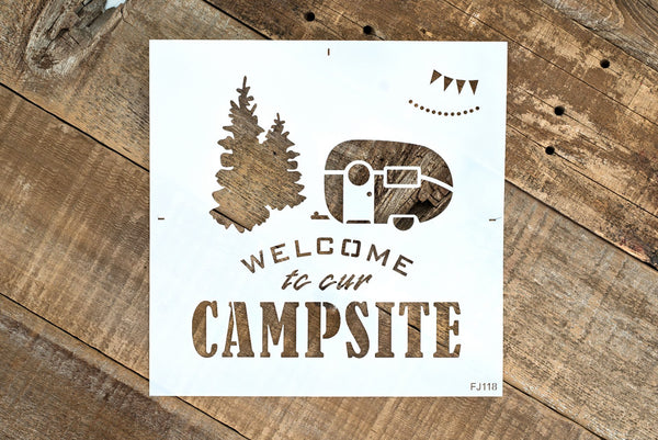 Welcome to our Campsite is a repeating, reusable camping stencil that celebrates your summer vacation home away from home! Comes with text, retro camper, evergreen trees, along with banner and string light graphics to decorate the camper and trees with.