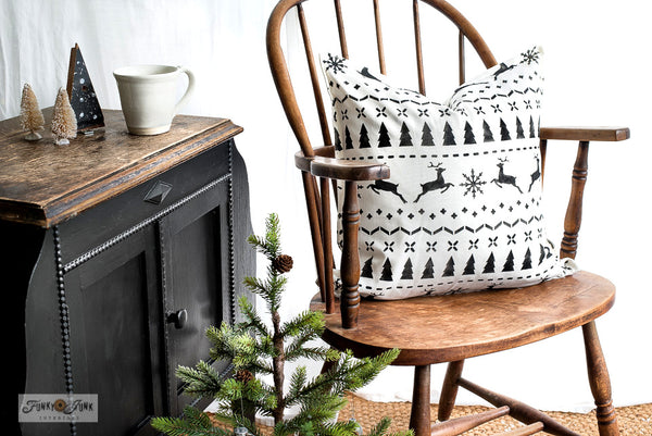 Christmas Sweater by Funky Junk's Old Sign Stencils is a repeating Christmas sweater pattern stencil that adds cozy festive charm to your painted projects! Designed with reindeer, a snowflake, trees and stitching patterns for an authentic sweater look. Sized in a square shape perfect for throw pillows.