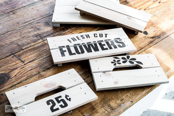 Fresh Cut Flowers 25 cents stencil by Funky Junk's Old Sign Stencils is a 1-piece flower stencil that celebrates displaying fresh cut flowers! Designed with subtext, bold FLOWERS, 25 cents, and flowers with leaves graphics. Designed to fit on small (IKEA) crates, create small signs, throw pillow designs and more!