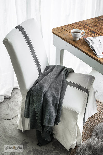 Stencil Grain Sack Stripes onto a white slipcovered Ikea chair to get this charming farmhouse look! By Funky Junk's Old Sign Stencils.