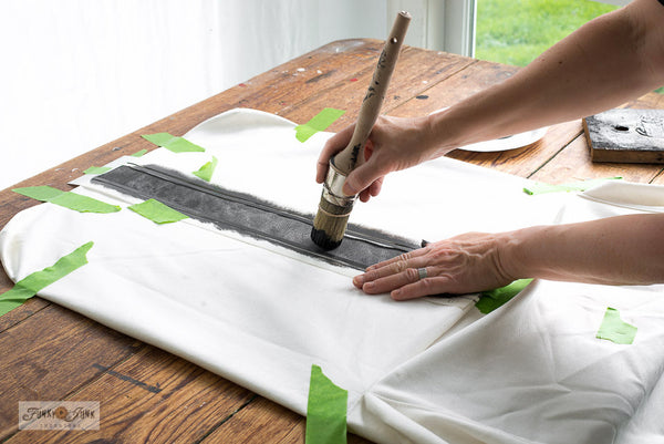 Stencil Grain Sack Stripes onto a white slipcovered Ikea chair to get this charming farmhouse look! By Funky Junk's Old Sign Stencils.