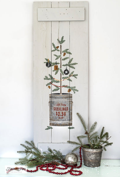 The Christmas Tree Seedling stencil features a Christmas tree seedling planted in a tin can, including a sign reading "Tree Farm Seedlings, 2.50 Each". This Christmas tree stencil features natural sparse branches attached to a woodsy stem, making decorating the tree so versatile! Makes the perfect Christmas porch sign!