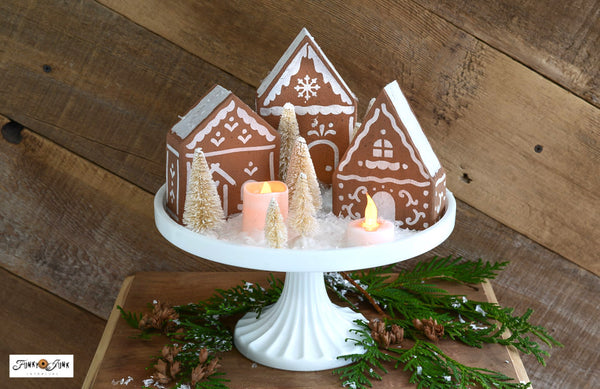 Create a dreamy holiday scene with the Gingerbread Village stencil! Included are three charming gingerbread houses with hand-drawn icing details. Included is a sky scene if stenciling on a flat surface, or use the additional stencil pieces designed to fit perfectly on cut 2x4s to create 3D houses.&nbsp;
