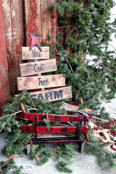 You Cut Tree pallet wood sign in a Buffalo Checked vintage sleigh for Christmas decor | stencilled with Funky Junk's Old Sign Stencils