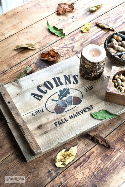 Acorns all-season or fall stencil by Funky Junk's Old Sign Stencils is a nut orchard themed stencil. Comes with bold text along with 2 capped acorn graphics and a leaf. Perfectly sized to stencil a harvested fall nut vibe onto crates, throw pillows, grain sacks or signs.