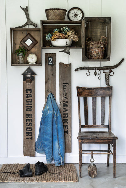 Old sign entry coat hooks made with Cabin Resort, Farmers' Market stencils. By Funky Junk's Old Sign Stencils