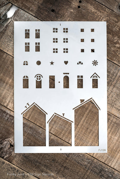 Christmas Village stencils by Funky Junk's Old Sign Stencils is a Christmas stencil kit that makes stenciling your own Christmas Village or wooden houses with ease! Includes 3 house images, with a selection of windows, doors and features such as a snowflake, heart and star. Designed to fit 2x4s to create wooden houses.