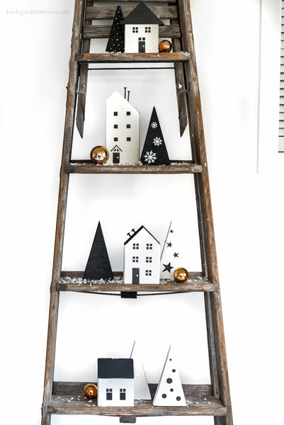 Christmas Village stencils by Funky Junk's Old Sign Stencils is a Christmas stencil kit that makes stenciling your own Christmas Village or wooden houses with ease! Includes 3 house images, with a selection of windows, doors and features such as a snowflake, heart and star. Designed to fit 2x4s to create wooden houses.