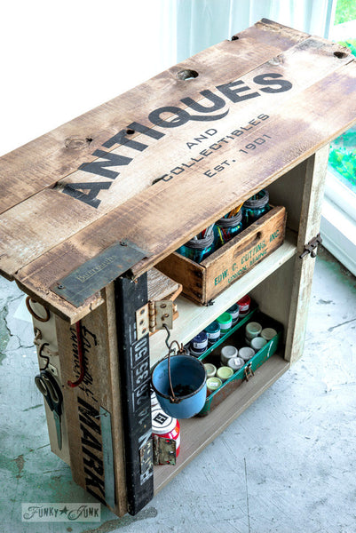 Reclaimed wood storage cupboard with Antiques by Funky Junk's Old Sign Stencils. Celebrate your love for vintage collections, by painting your own old Antiques sign onto reclaimed wood, furniture, etc!