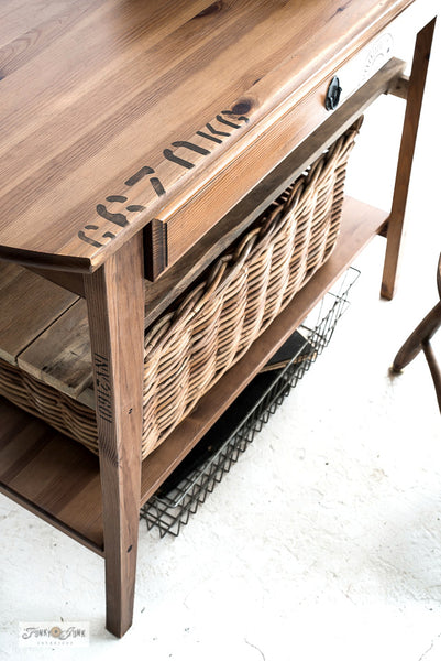 Get the look of a pallet by stenciling Pallet Stamps on your wooden projects! This Ikea hacked table shows you how. By Funky Junk's Old Sign Stencils.
