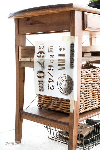 Get the look of a pallet by stenciling Pallet Stamps on your wooden projects! This Ikea hacked table shows you how. By Funky Junk's Old Sign Stencils.