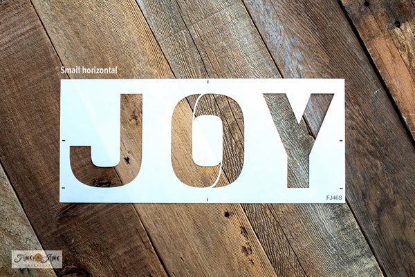 Joy - Small is a festive Christmas sign stencil design bursting with loads of creative mix & match options! Use Joy by itself in horizontal or vertical formats, with the option to replace the O in Joy with Accessories, that include 2 snowflakes, ornament, hook, ribbon, and to the world text. 