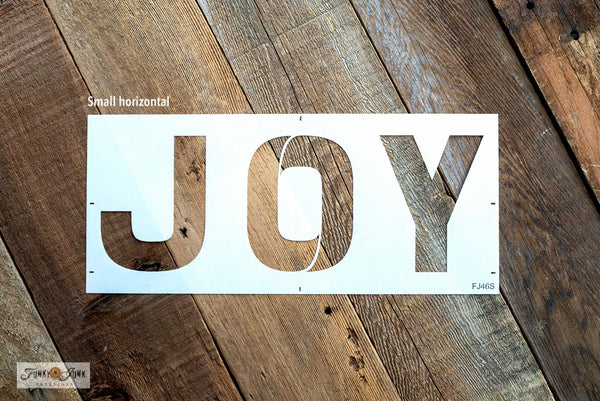 Joy - Small is a festive Christmas sign stencil design bursting with loads of creative mix & match options! Use Joy by itself in horizontal or vertical formats, with the option to replace the O in Joy with Accessories, that include 2 snowflakes, ornament, hook, ribbon, and to the world text. 