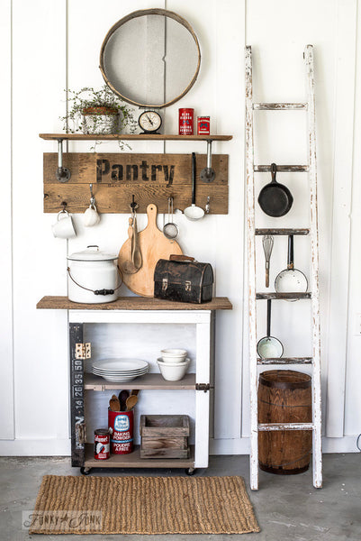 Reclaimed wood and pipe shelf made with Pantry by Funky Junk's Old Sign Stencils. Paint professional looking vintage farmhouse styled pantry signs onto reclaimed wood with a stencil in minutes!