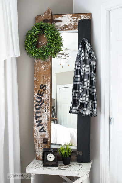 Reclaimed wood framed mirror with Antiques by Funky Junk's Old Sign Stencils. Celebrate your love for vintage collections, by painting your own old Antiques sign onto reclaimed wood, furniture, etc!