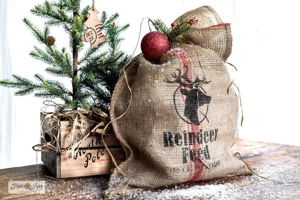 Reindeer Feed is a Christmas-themed stencil designed to mimic a feed grain sack. A reindeer head logo surrounded by gentle falling snow, along with a net weight  makes this one feel like the real deal. Perfect for signs, pillows, gifts, and would look charming as a Santa sack to wrap presents with!