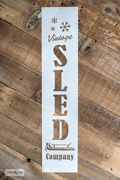 Vintage Sled Company by Funky Junk's Old Sign Stencils is a winter and Christmas stencil designed to decorate your own smaller sleds or taller toboggans! 2 sizes to choose from, both designed with bold text, falling snowflakes, and a vintage sled graphic with a pull rope and sleigh bell.