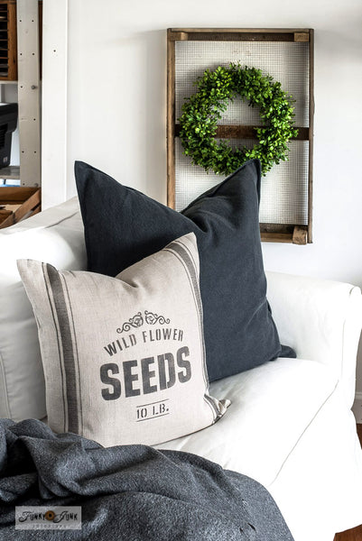 Make this vintage-inspired Wild Flower Seeds pillow with a 20" Ikea pillow cover, plus Wild Flower Seeds and Grain Sack Stripe G4L stencils from Funky Junk's Old Sign Stencils!