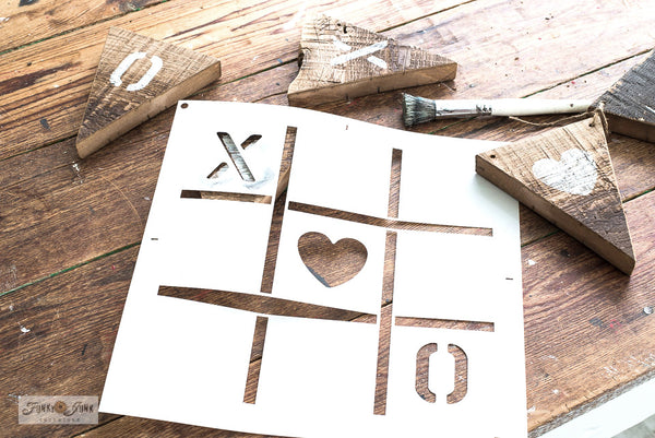 Make this rustic scrap wood Valentine's Day banner with Valentine Crates and Tic Tac Toe from Funky Junk's Old Sign Stencils!