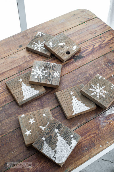 Reclaimed wood coasters made with Winter Graphics by Funky Junk's Old Sign Stencils. Paint professional looking winter themed designs consisting of 3 sizes of snowflakes, hot cocoa, 2 arrows, and 25 cents this stencil! All designs on one sheet.