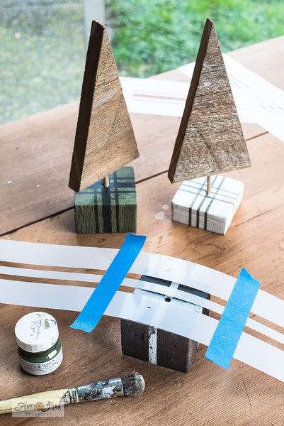 Stencil present ribbon on wood blocks to create these charming scrap wood Chrismtas trees in presents! With Grain Sack Stripes from Funky Junk's Old Sign Stencils!