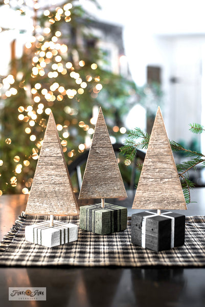 Stencil present ribbon on wood blocks to create these charming scrap wood Chrismtas trees in presents! With Grain Sack Stripes from Funky Junk's Old Sign Stencils!
