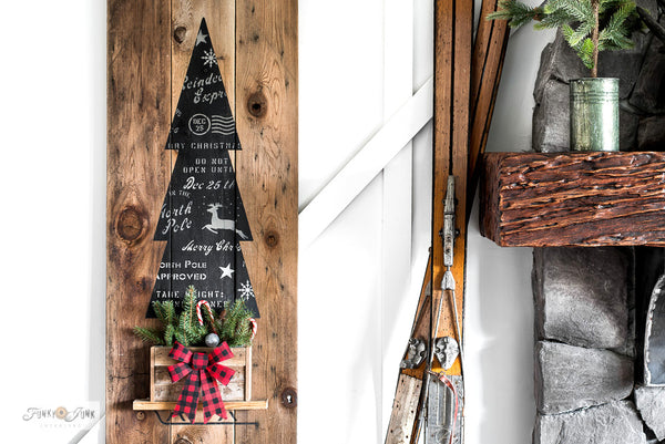 Tall Christmas Tree in Crate is a vertical winter / Christmas themed stencil that celebrates creative tree decorating! Designed as a tall evergreen tree, tucked inside a rustic crate tree skirt set on top of a sleigh. Makes the perfect front porch sign for Christmas decorating.